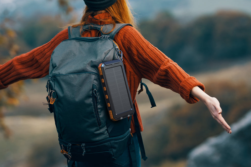 Multi-Functional 10,000mAh Power Bank with Solar Recharging, LED Flashlights, and Compass